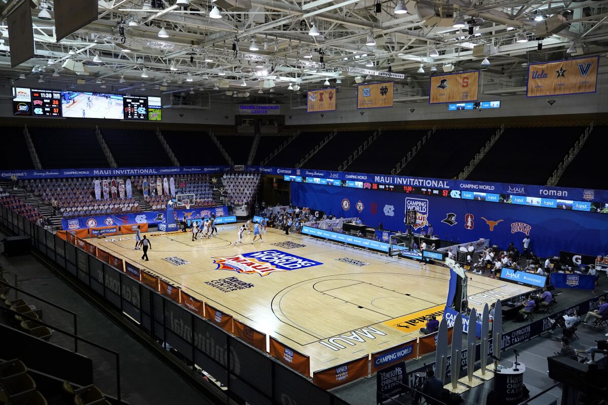 Teams warm up prior to a Maui Invitational game in Asheville, N.C.