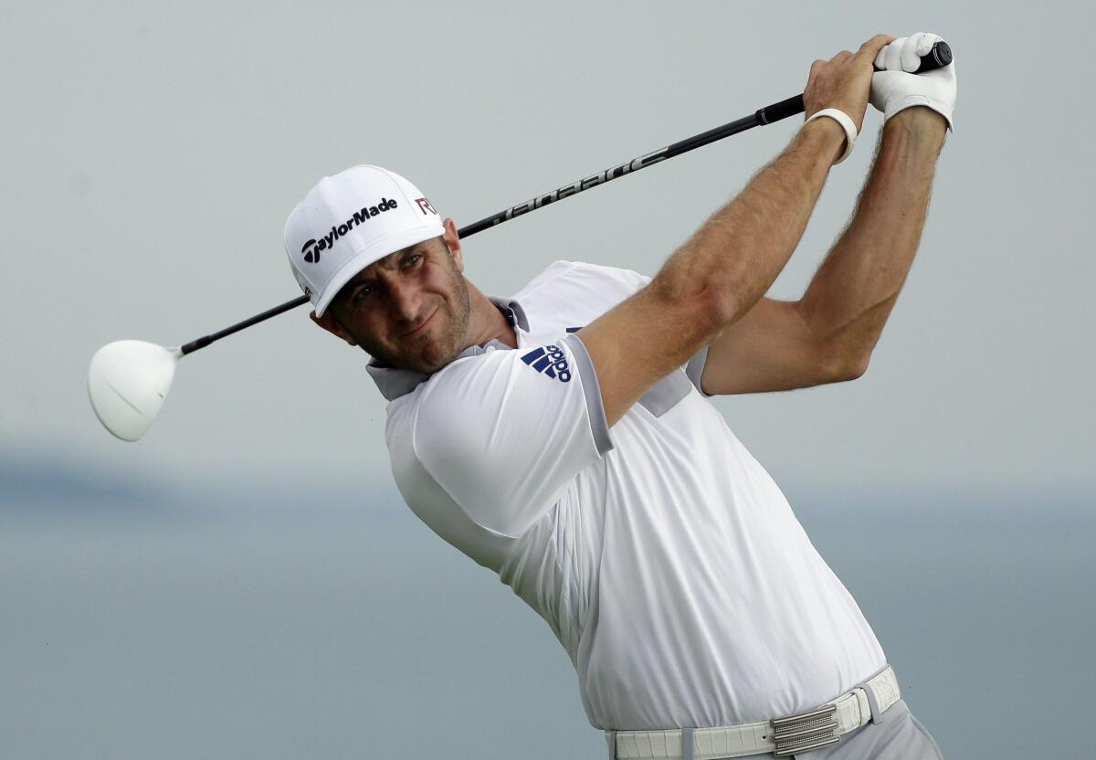 Dustin Johnson hits a drive on the 16th hole during the first round of the PGA Championship at Whistling Straits in Haven, Wis., on Aug. 13.