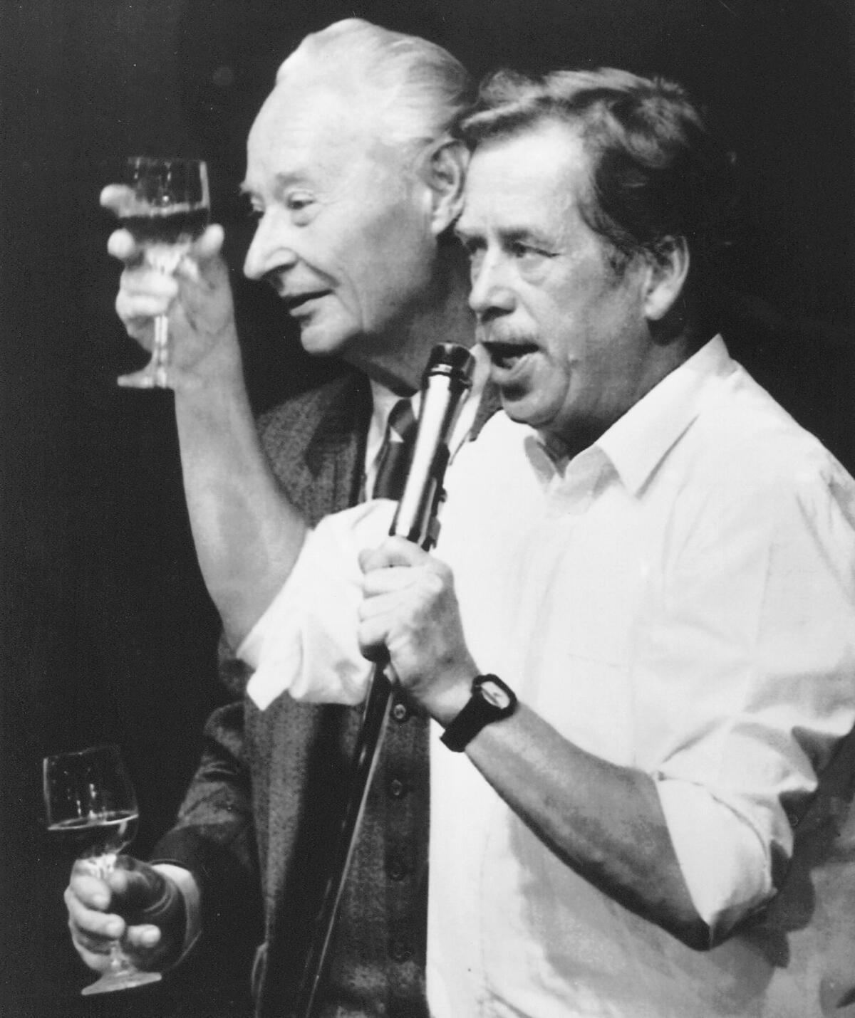 Vaclav Havel, leader of the Prague opposition, right, and Alexander Dubcek, leader of the ill-fated Prague Spring, left, toast on Nov. 24, 1989.