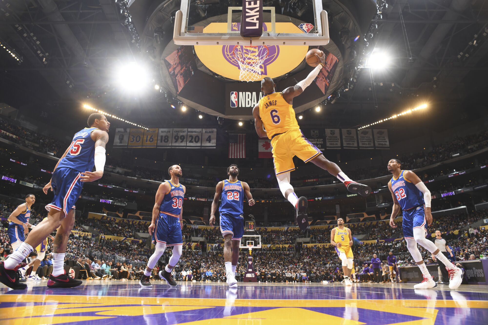 Lakers star LeBron James dunks during the second half of a 124-116 win over the Golden State Warriors.