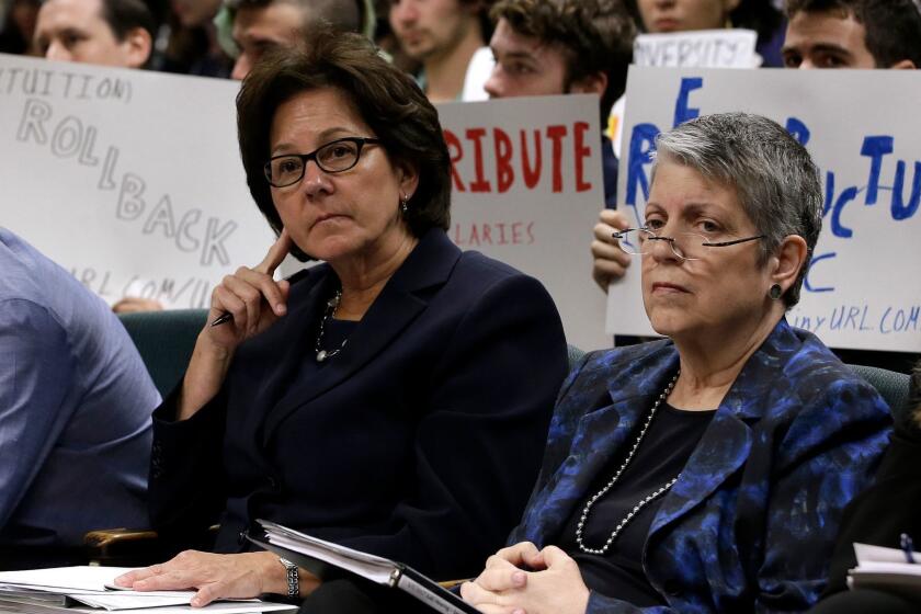 Monica Lozano, left, chair of the University of California Board of Regents, and UC President Janet Napolitano, sit in the audience before appearing before the Joint Legislative Audit Committee Tuesday, May 2, 2017, in Sacramento, Calif. Lawmakers where looking into an audit, conducted by the office of State Auditor Elaine Howle, that found that UC administrators hid $175 million from the public while the university system raised tuition and asked lawmakers for more money. Napolitano has disputed the audit's findings.(AP Photo/Rich Pedroncelli)