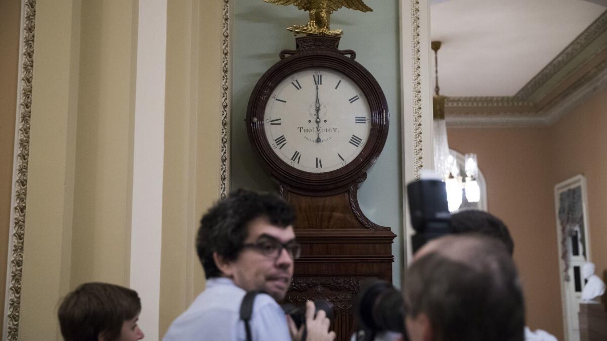 The clock strikes midnight in the U.S. Capitol.