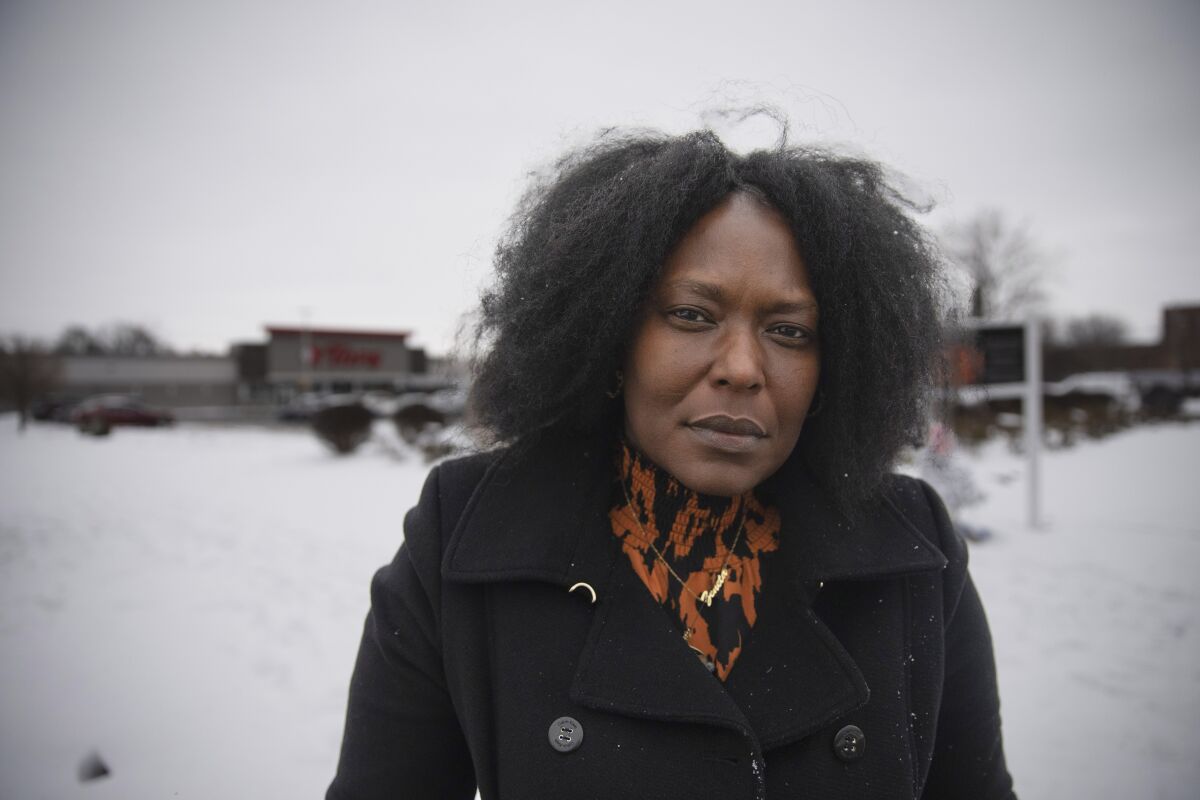 Zeneta Everhart stands outside a Tops supermarket in Buffalo, N.Y., on Jan. 27, 2023. Ten people were killed in the store in May 2022 after a gunman entered targeting Black people. Everhart's then-19-year-old son survived after being shot in the neck. “You know, we don’t want to hear about this. We don’t want to hear about our children dying by gun violence, and we don’t want to hear about our seniors” who were killed in the California studio attack. “How awful. How heartbreaking.” (AP Photo/Robert Bumsted)