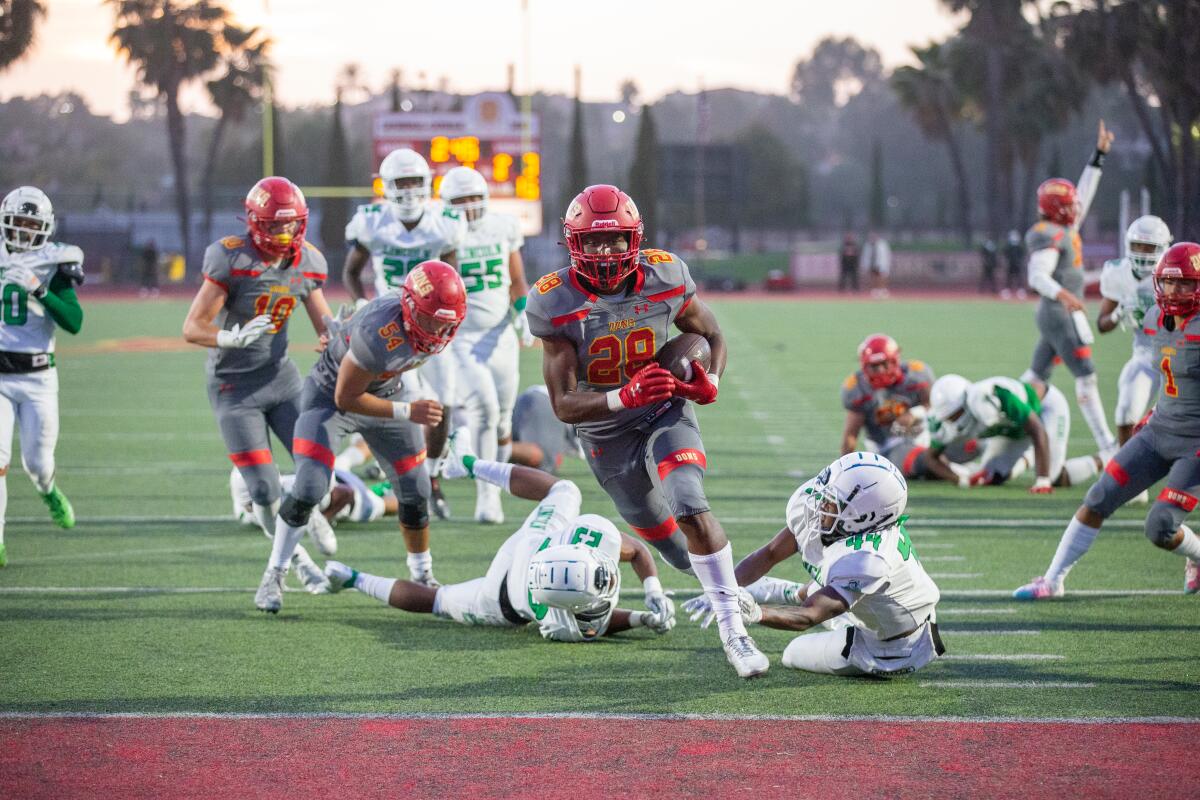 A Cathedral Catholic High player runs for a touchdown against Lincoln in Friday's 41-0 victory.