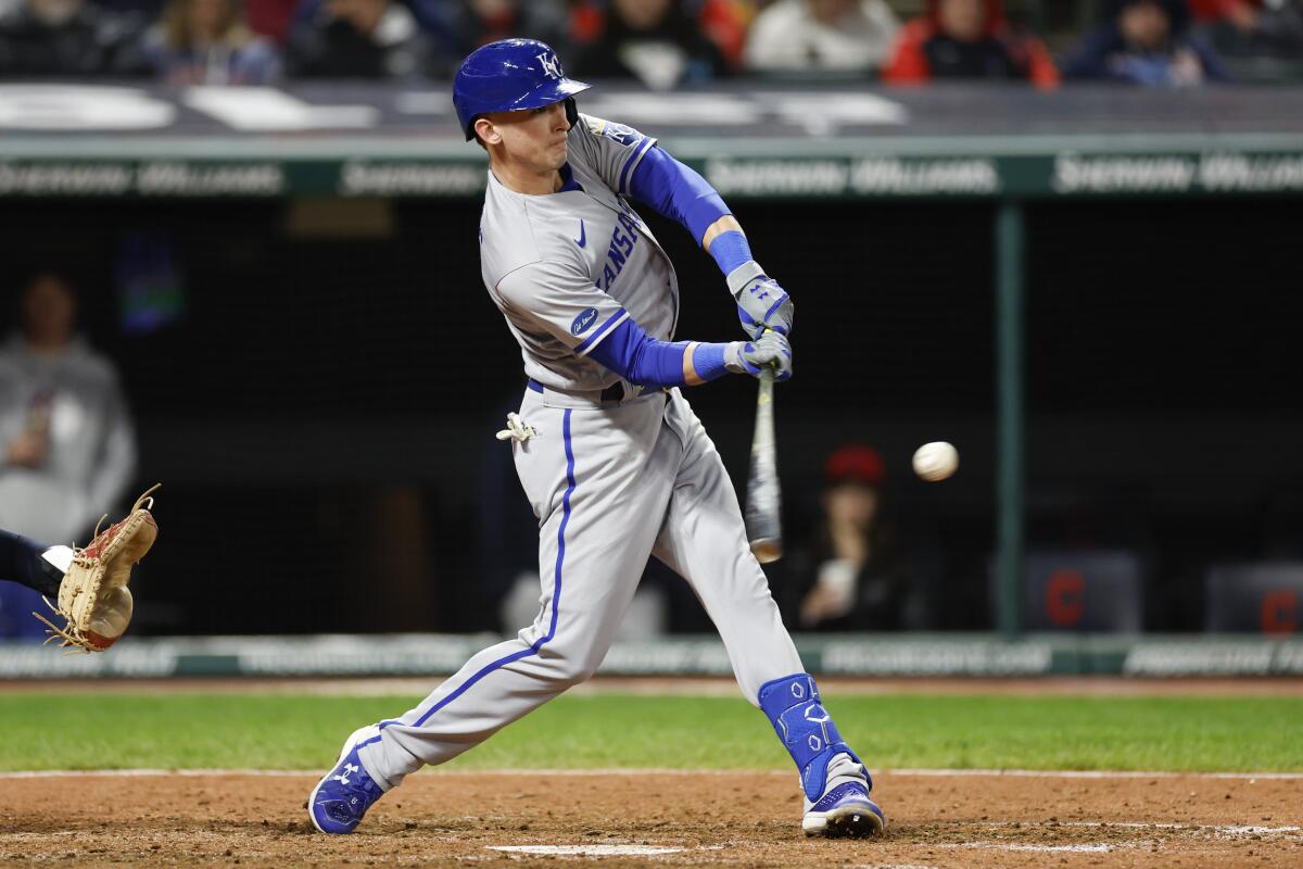 Kansas City Royals' Drew Waters hits a three-run home run off Cleveland Guardians relief pitcher Kirk McCarty during the 10th inning of a baseball game, Monday, Oct. 3, 2022, in Cleveland. (AP Photo/Ron Schwane)