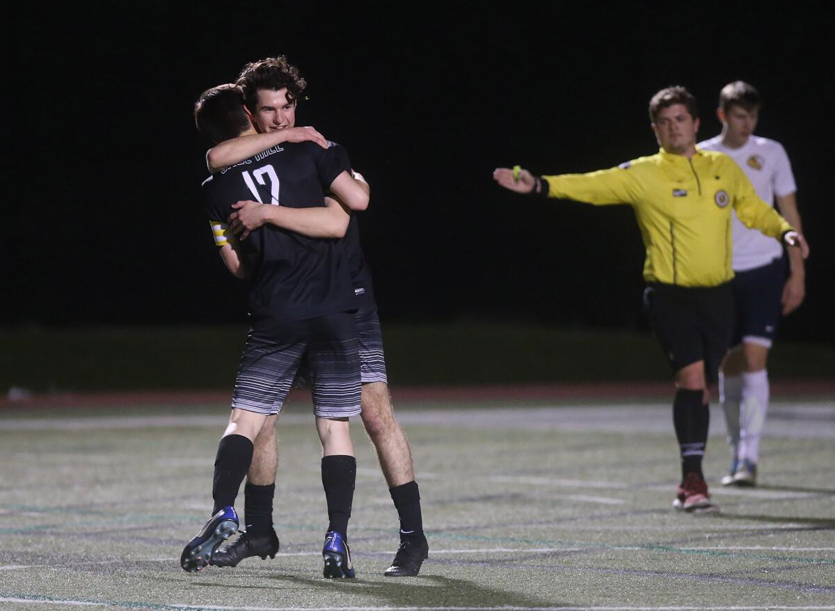 Sage Hill's Emir Karabeg celebrates with teammate Jonathan Lake (12) after scoring a goal in the 19th minute of a San Joaquin League match against Tarbut V'Torah on Thursday.
