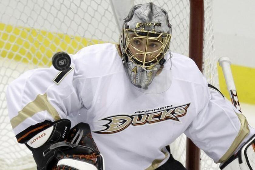 Ducks goaltender Jonas Hiller blocks a shot against the Pittsburgh Penguins last season.