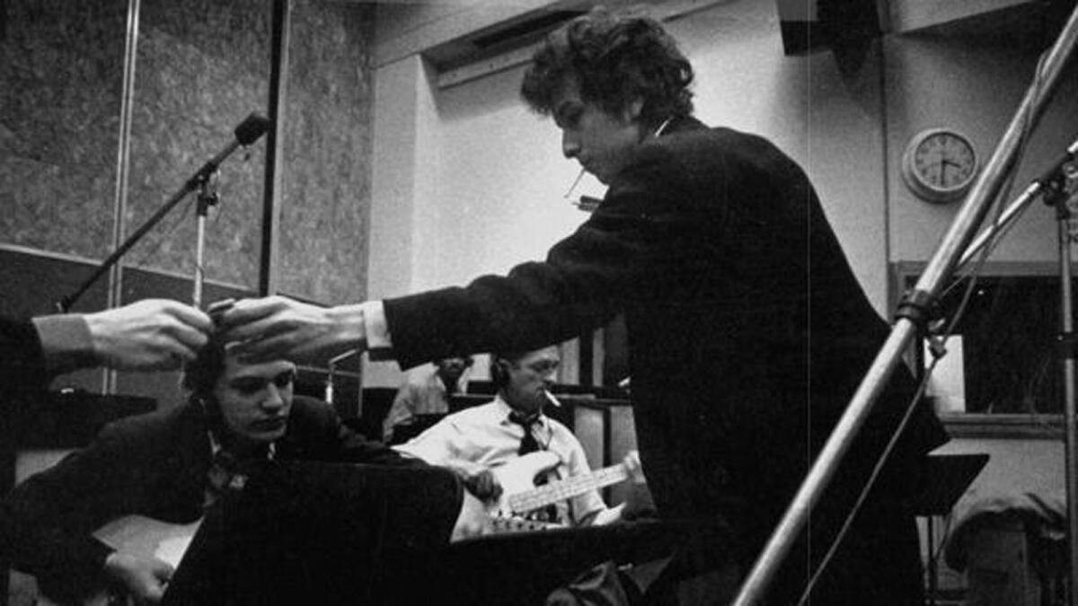 Bob Dylan in a recording studio during one of the most fertile periods of his long career. (Eugene Smith)