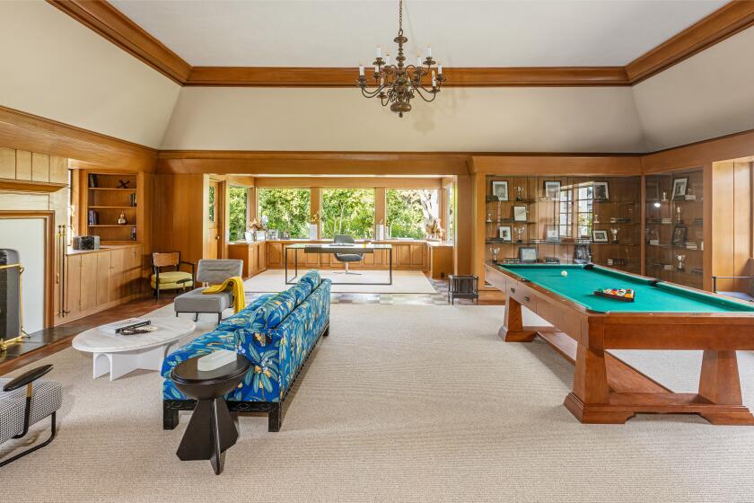 Built in 1939 and restored multiple times since, the five-acre estate comes with a 15,000-square-foot home, tennis court, saltwater pool and golf course.