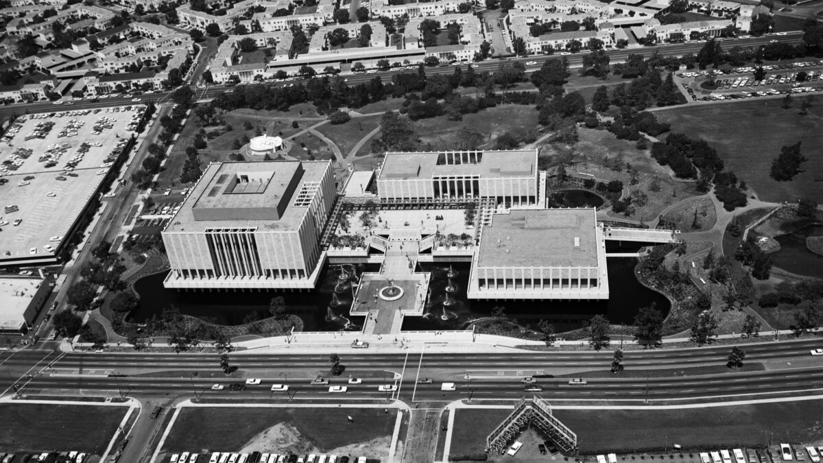 An aerial shot taken in the 1960s shows LACMA as it was designed by William L. Pereira and Associates. The pools evoke the tar pits nearby.