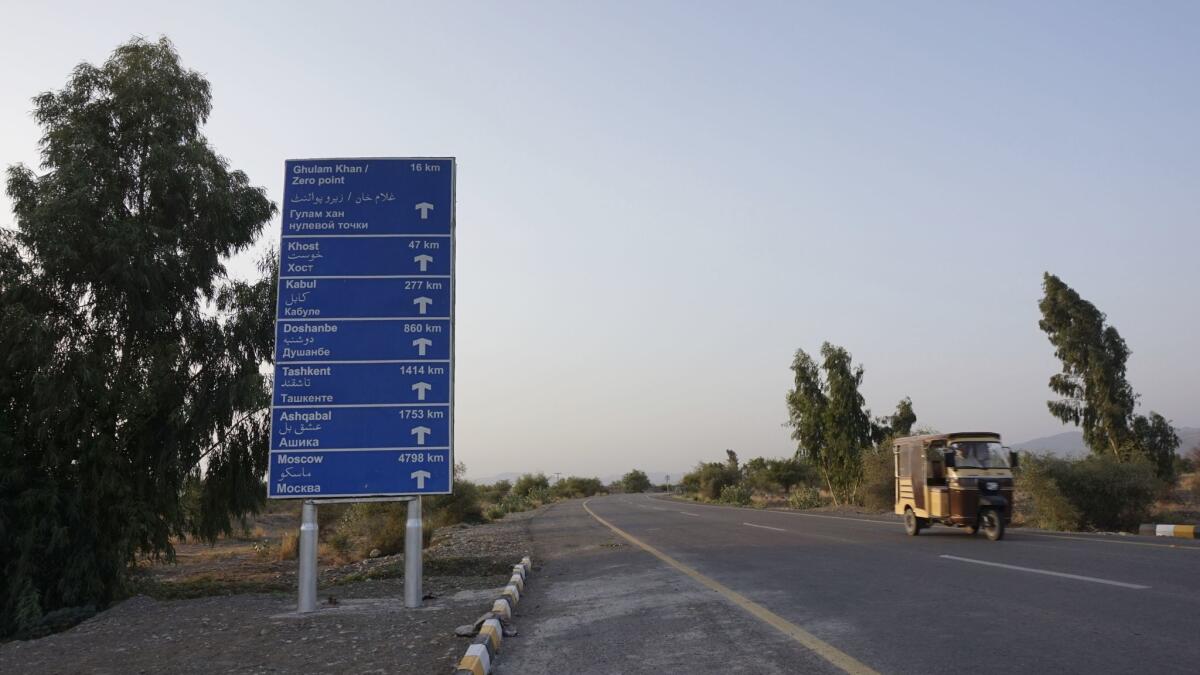A signpost on the newly constcuted road from Miramshah to the Afghanistan border, at the entrance to the miltiary headquarters.