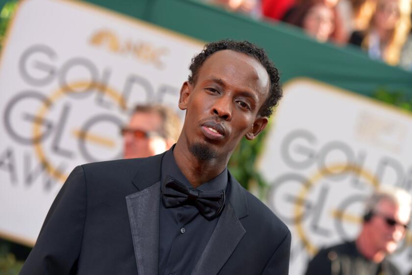 Barkhad Abdi, a supporting actor nominee for "Captain Phillips," arrives at the 71st Golden Globe Awards at the Beverly Hilton on Sunday.