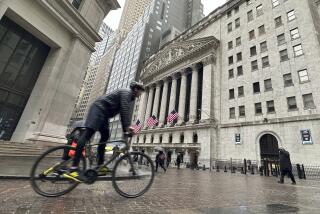 FILE - A bicyclist passes the New York Stock Exchange on March 5, 2024, in New York. Stocks are rising Monday, March 18, 2024 ahead of a busy week for central banks around the world that could dictate where interest rates go.The S&P 500 was Tk% higher in early trading, coming off its first back-to-back weekly loss since October. (AP Photo/Peter Morgan, file)