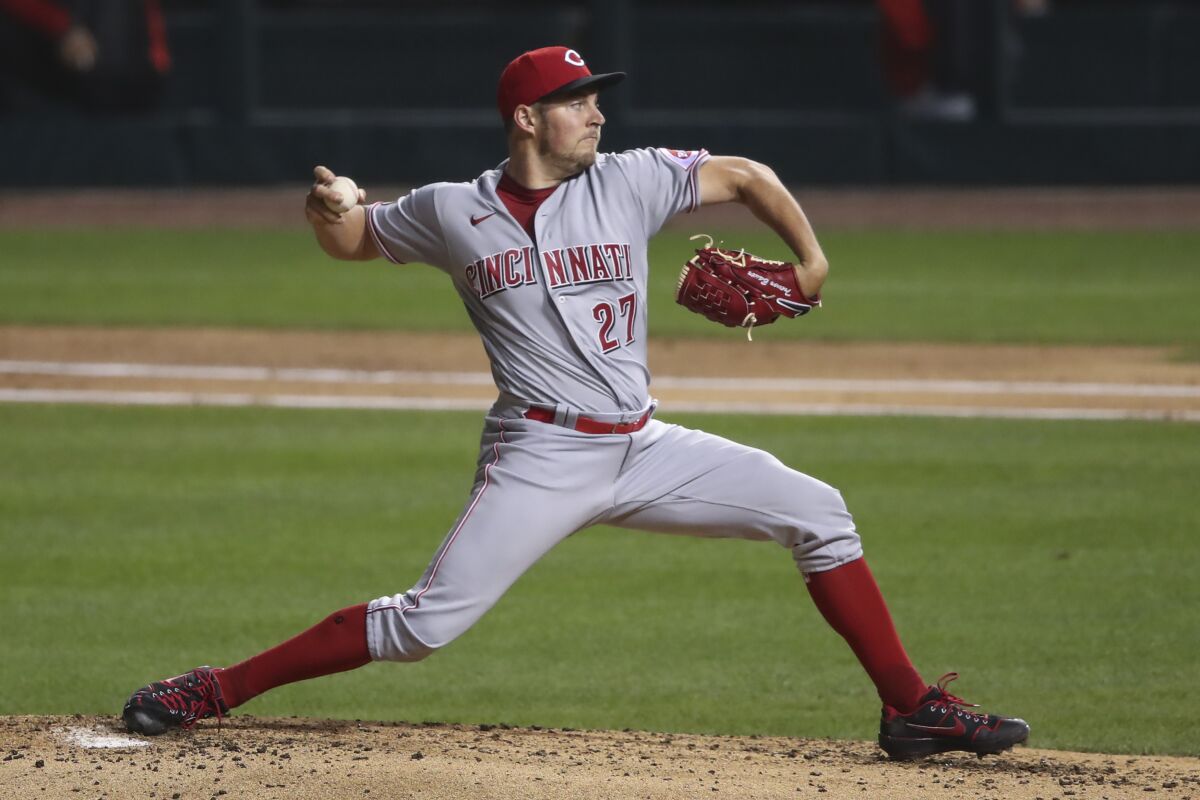 Cincinnati Reds starting pitcher Trevor Bauer delivers to a Chicago Cubs batter during the third inning of a baseball game Wednesday, Sept. 9, 2020, in Chicago. (AP Photo/Kamil Krzaczynski)