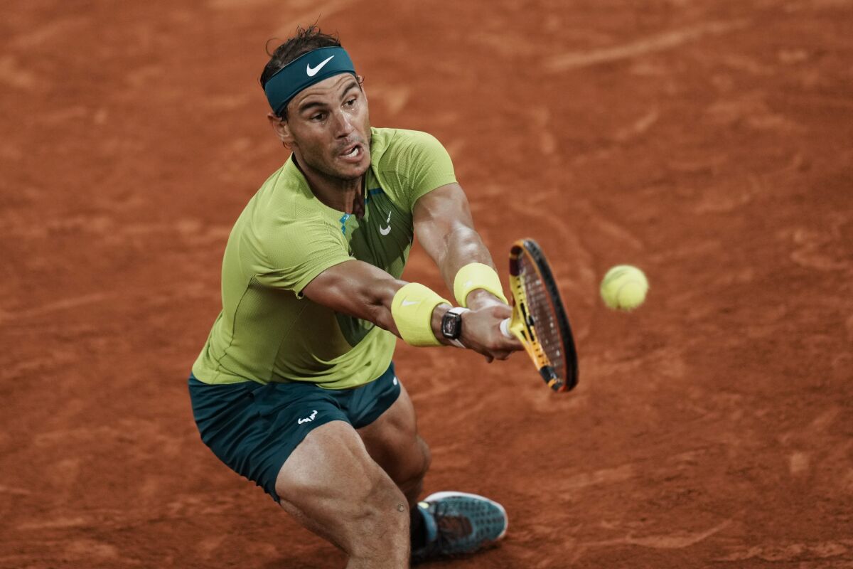 Spain's Rafael Nadal plays a shot against Germany's Alexander Zverev during their semifinal match at the French Open tennis tournament in Roland Garros stadium in Paris, France, Friday, June 3, 2022. (AP Photo/Thibault Camus)