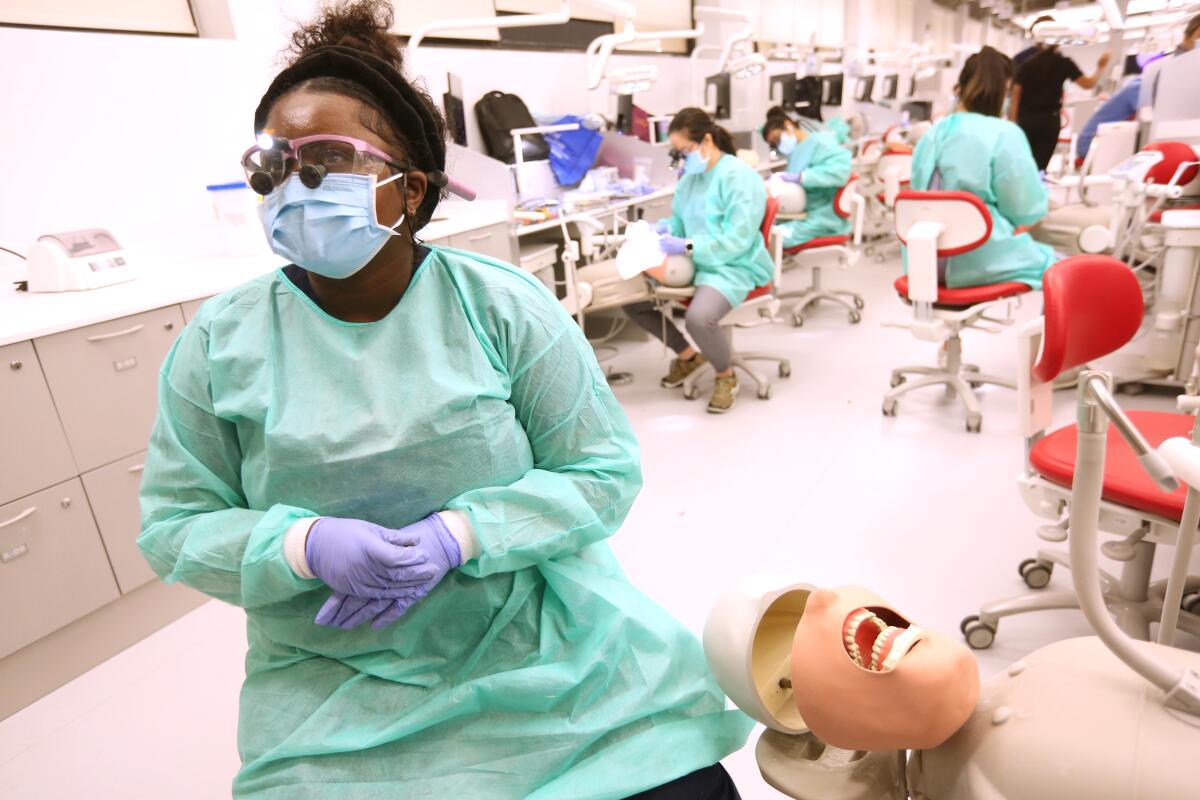 Somkene Okwuego attends a class at the Herman Ostrow School of Dentistry of USC.