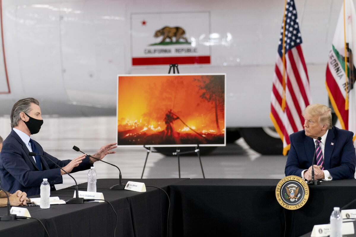 Then-President Trump participates in a briefing with Gov. Gavin Newsom in Sacramento in 2020. 