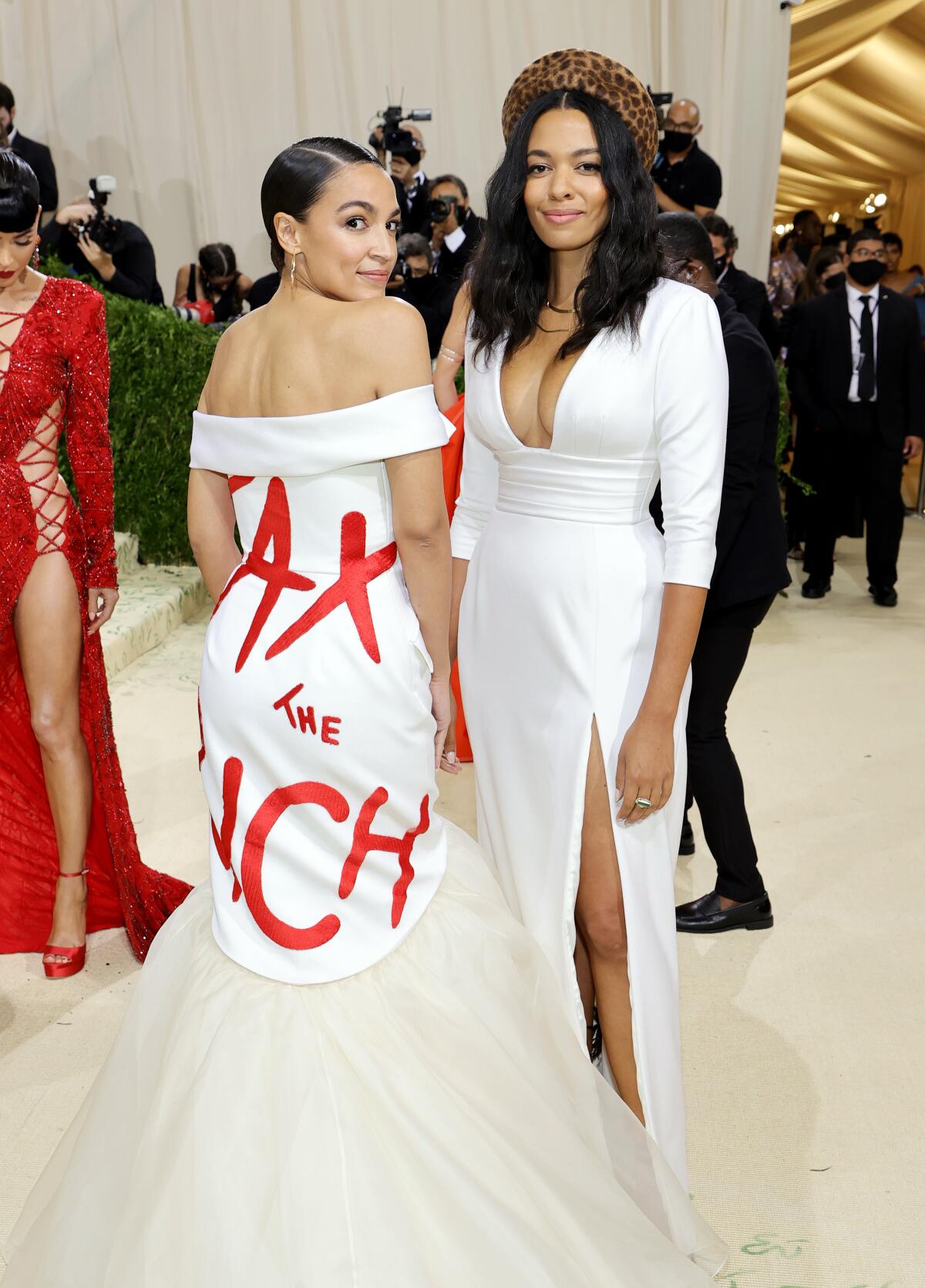 Alexandria Ocasio-Cortez, left, at the 2021 Met Gala. 