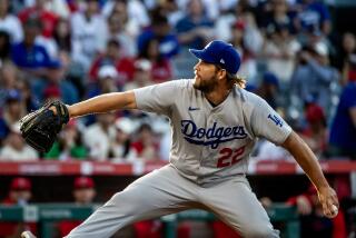 Dodgers' Clayton Kershaw pitches against the Angels on June 20, 2023 in Anaheim.