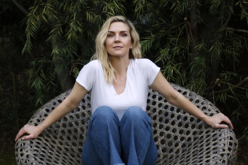 LOS ANGELES CA - FEBRUARY 5, 2020 - Actor Rhea Seehorn of the AMC show, “Better Call Saul,” reclines at her home in Los Angeles on February 5, 2020. Seehorn plays attorney Kim Wexler on, "Better Call Saul," the spinoff to "Breaking Bad." Kim is the girlfriend of Saul Goodman, the sketchy attorney played by Bob Odenkirk. Many fans fear that Kim is living on borrowed time because Saul is getting closer to the criminal element, and her character is not in "Breaking Bad." (Genaro Molina / Los Angeles Times)