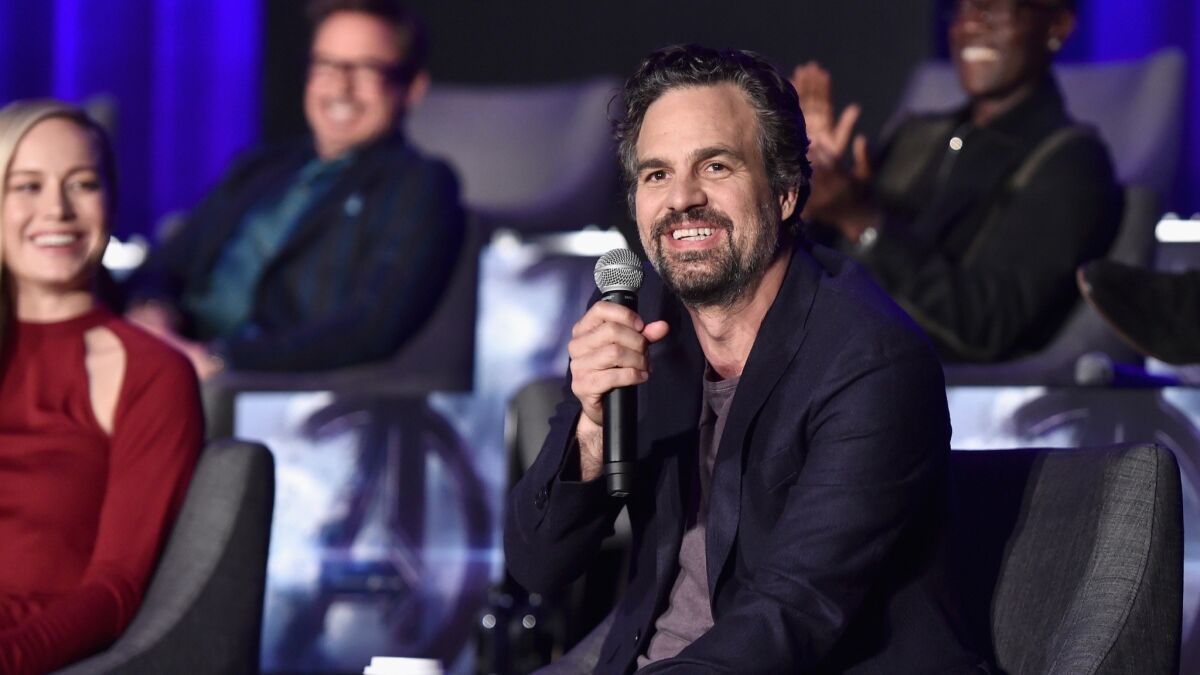 Brie Larson and Mark Ruffalo, with Robert Downey Jr. and Don Cheadle in the background, during Marvel Studios' "Avengers: Endgame" Global Junket press conference at the InterContinental Los Angeles, April 7, 2019.