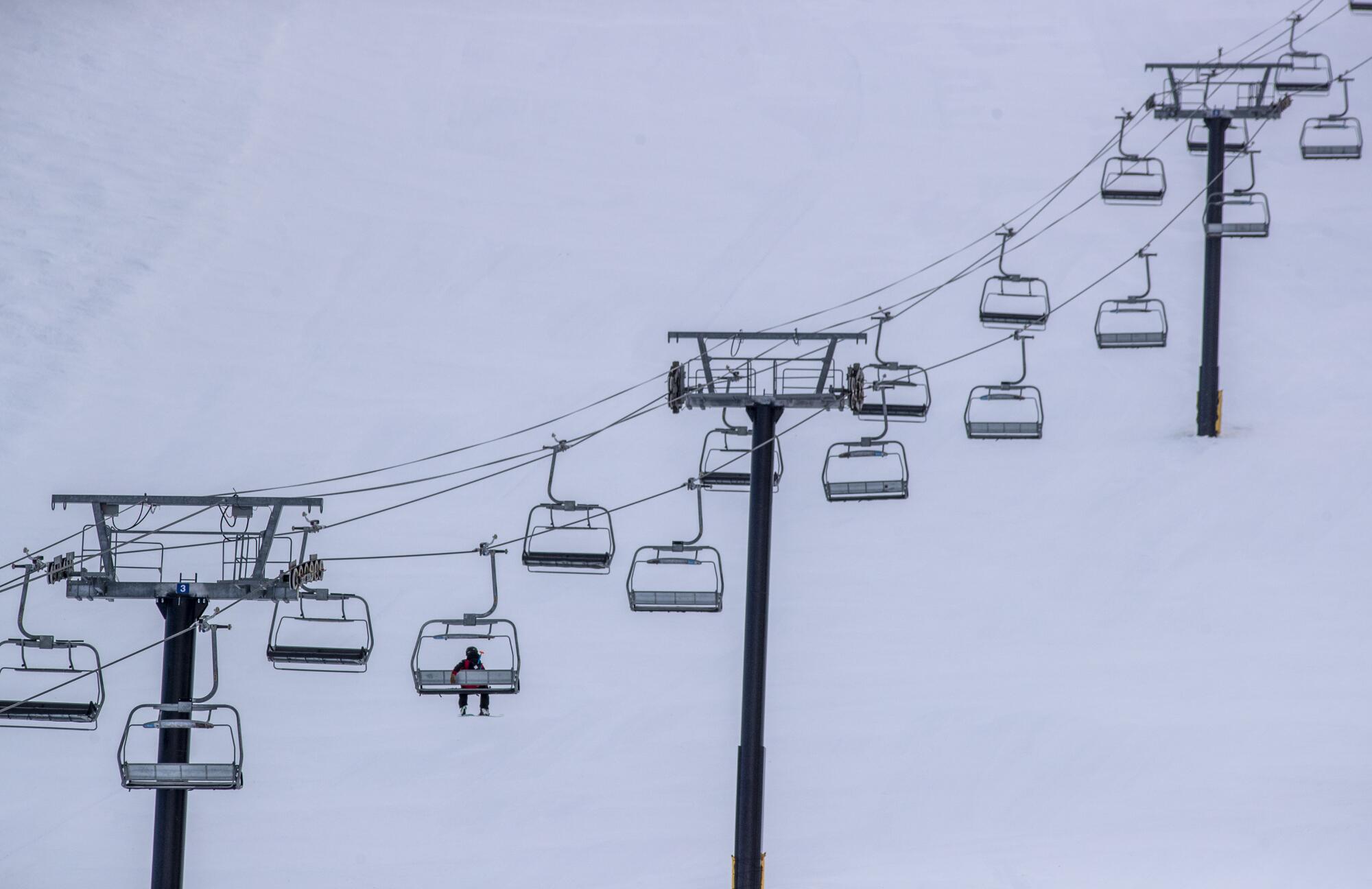 A ski lift is almost empty