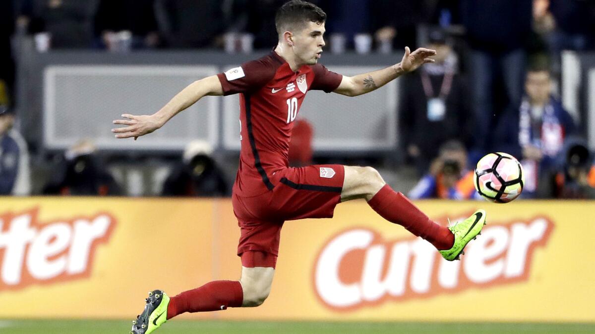 Christian Pulisic receives a pass during the U.S. win over Honduras.