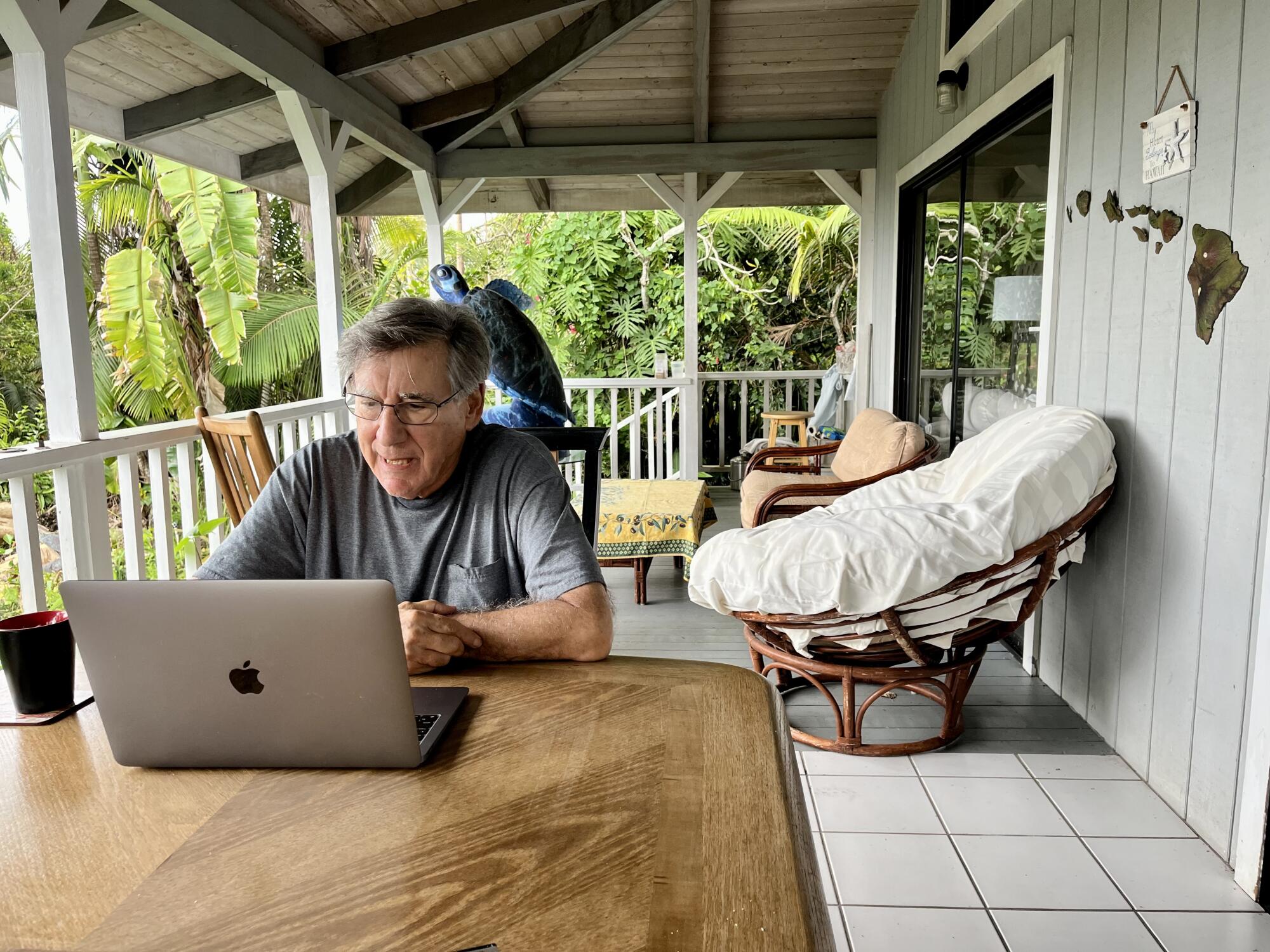 Jon Lomberg talks via Zoom to students at Avenues school from the patio of his home in Honaunau, Hawaii.