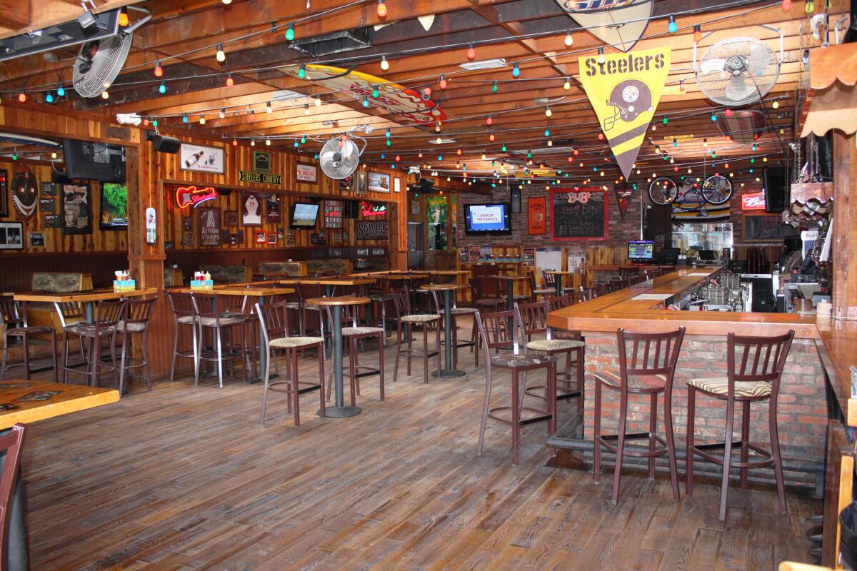 A Pittsburgh Steelers pennant is among decorations found in Bub's at the Beach.