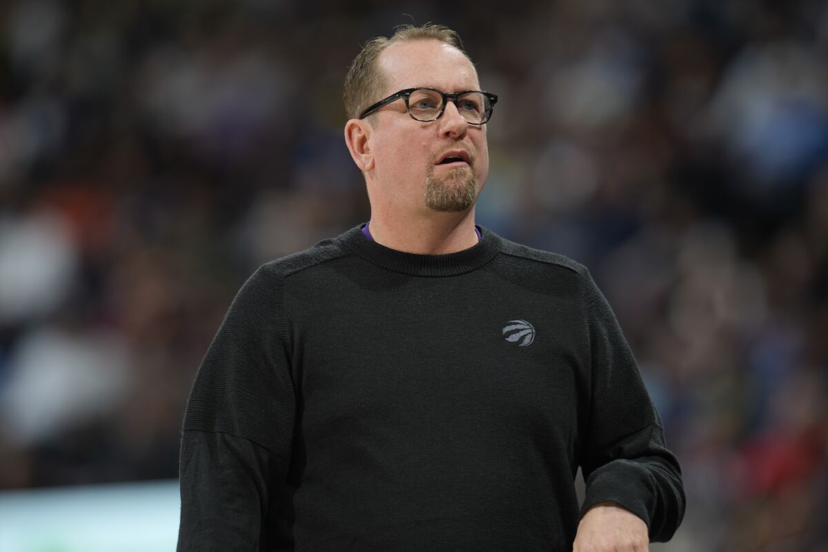 Toronto Raptors head coach Nick Nurse directs his team against the Denver Nuggets in the first half of an NBA basketball game, Monday, March 6, 2023, in Denver. (AP Photo/David Zalubowski)