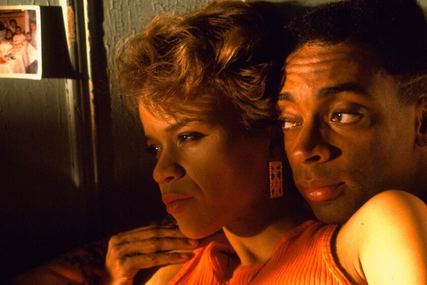 Rosie Perez and Spike Lee in the 1989 movie Do The Right Thing .