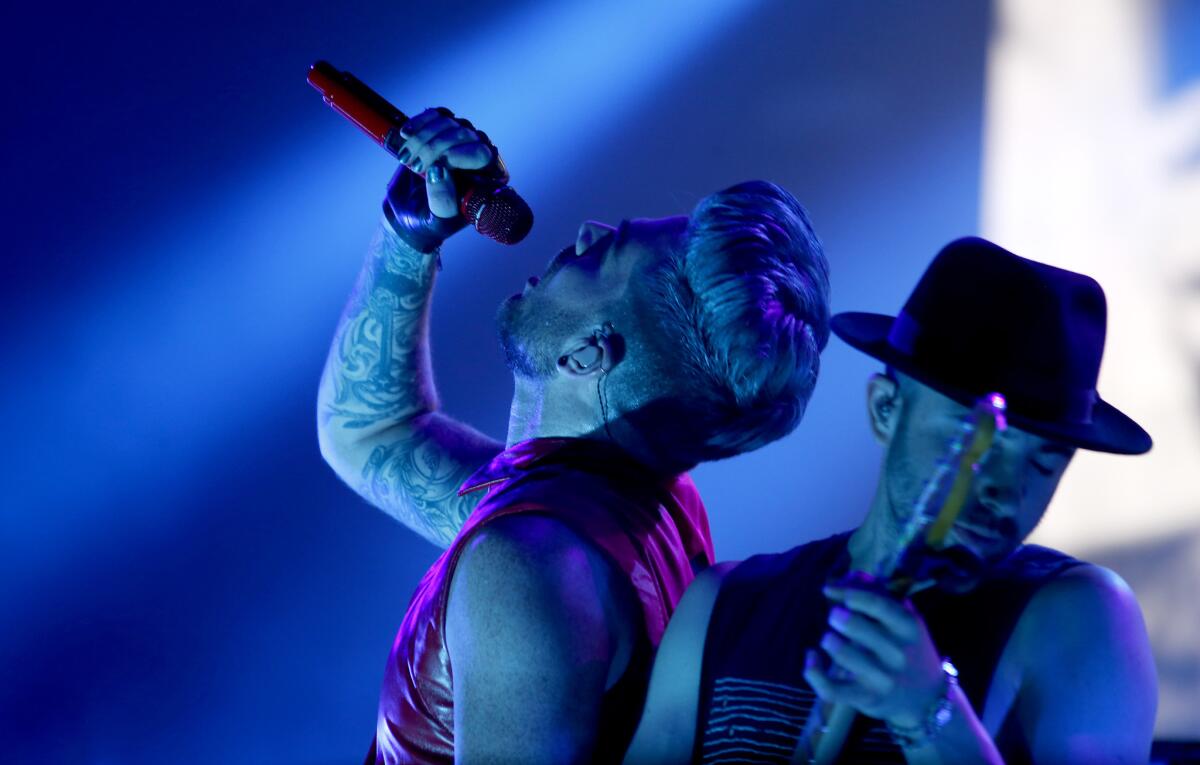 Adam Lambert performs Saturday night at the Orpheum Theatre in Los Angeles.
