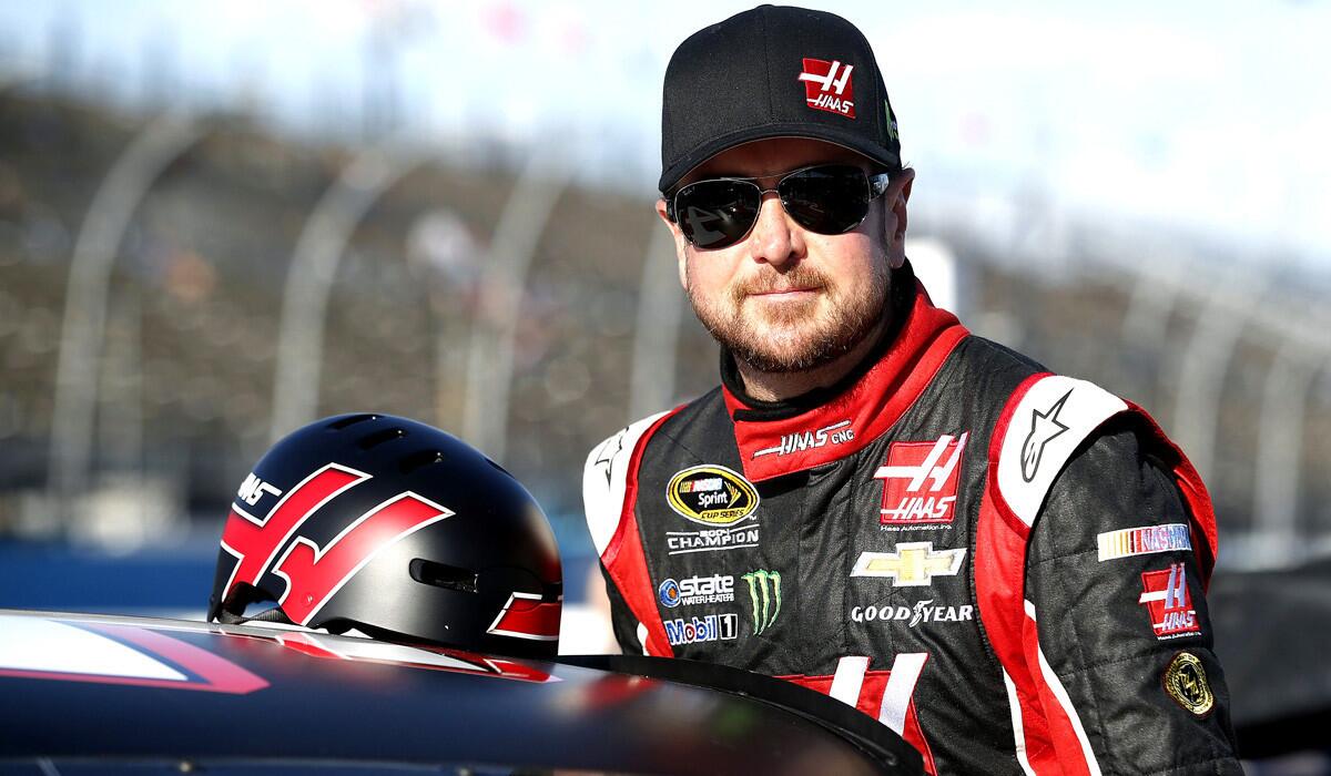 Kurt Busch gets ready to qualify for Sunday's NASCAR Sprint Cup Series auto race on Friday in Avondale, Ariz.