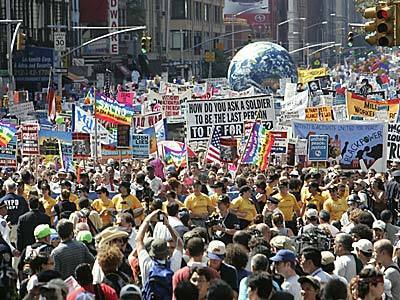 Protesters march up Seventh Avenue Sunday, past Madison Square Garden, the site of the 2004 Republican Convention