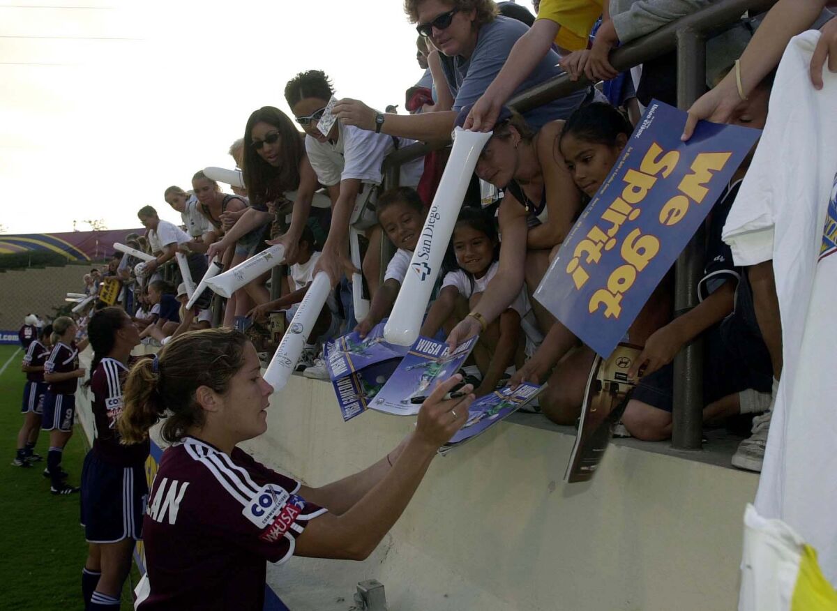 San Diego Spirit star Shannon Mac Millan signed autographs after the final game of the 2001 WUSA season.