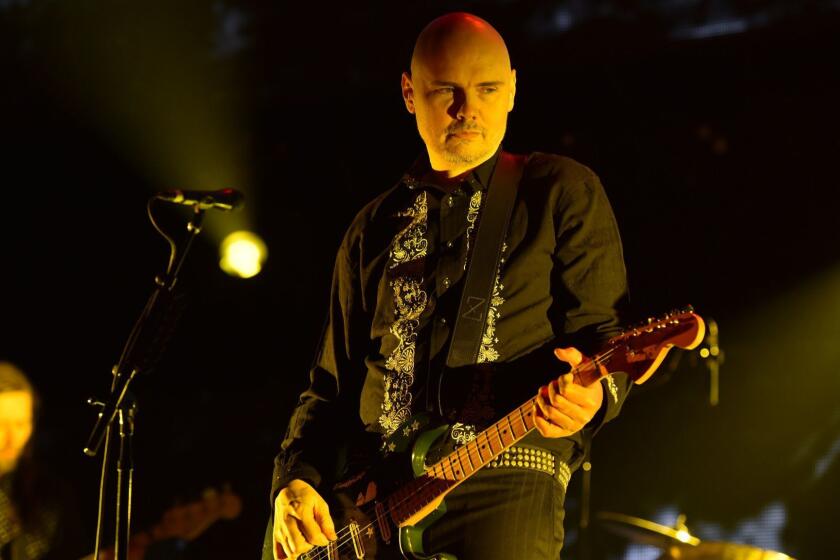 FILE - In this Dec. 14, 2014 file photo, Billy Corgan, of The Smashing Pumpkins, performs at the 25th annual KROQ Almost Acoustic Christmas at The Forum in Inglewood, Calif. Live Nation announced on Thursday, April 30, 2015, that the first National Concert Day will be held on May 5 in New York. (Photo by John Shearer/Invision/AP, File) ORG XMIT: CAET469