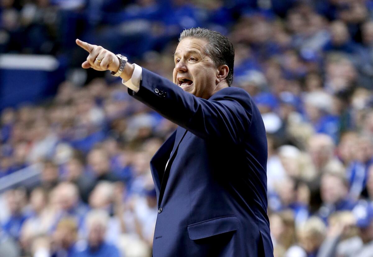 Kentucky Coach John Calipari gives insturctions to his team during a game against Mississippi State on Jan. 12.