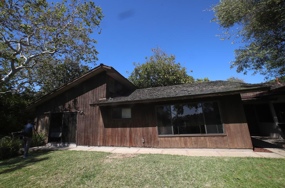 The Johns' home at 2600 Mesa Drive went on the market Wednesday.