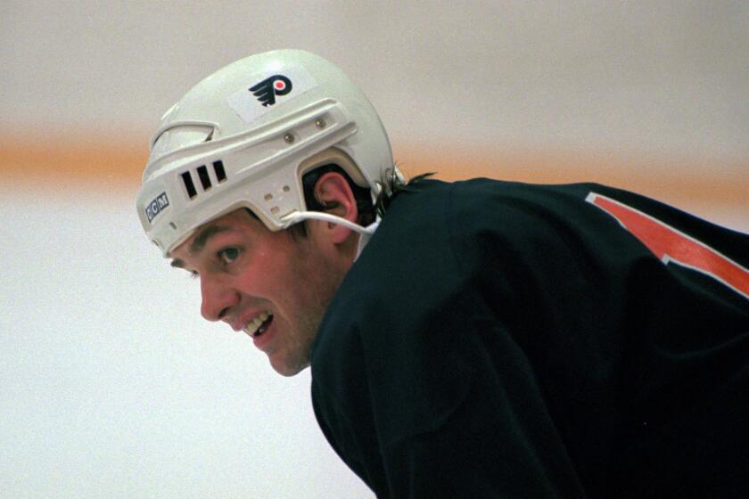 Dale Hawerchuk, a forward with the Philadelphia Flyers, takes a rest during practice at the Coliseum in Voorhees, N.J., Tuesday, April 30, 1996. Hawerchuk, a hockey phenom who became the face of the Winnipeg Jets en route to the Hall of Fame, has died at the age of 57 after a battle with cancer. The Ontario Hockey League’s Barrie Colts, a team Hawerchuk coached, confirmed the death on Twitter on Tuesday, Aug. 18, 2020. (AP Photo/Nanine Hartzenbusch)