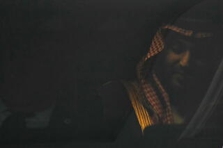 Crown Prince Mohammed bin Salman is seen inside a vehicle.