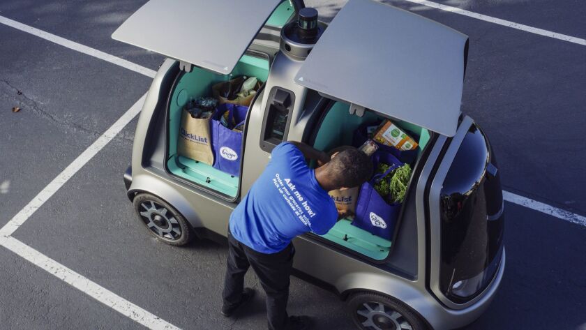 A photo provided by Kroger Co. shows a driverless car that the company is about to test that would deliver groceries directly to a consumer's home.