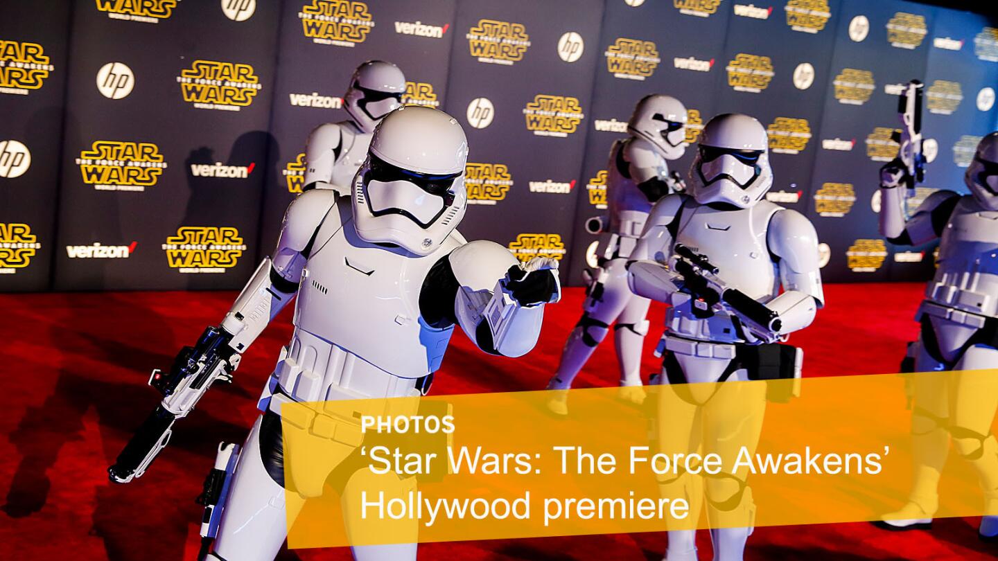 Stormtroopers interact with the crowd at the red-carpet premiere of "Star Wars: The Force Awakens" in Hollywood.