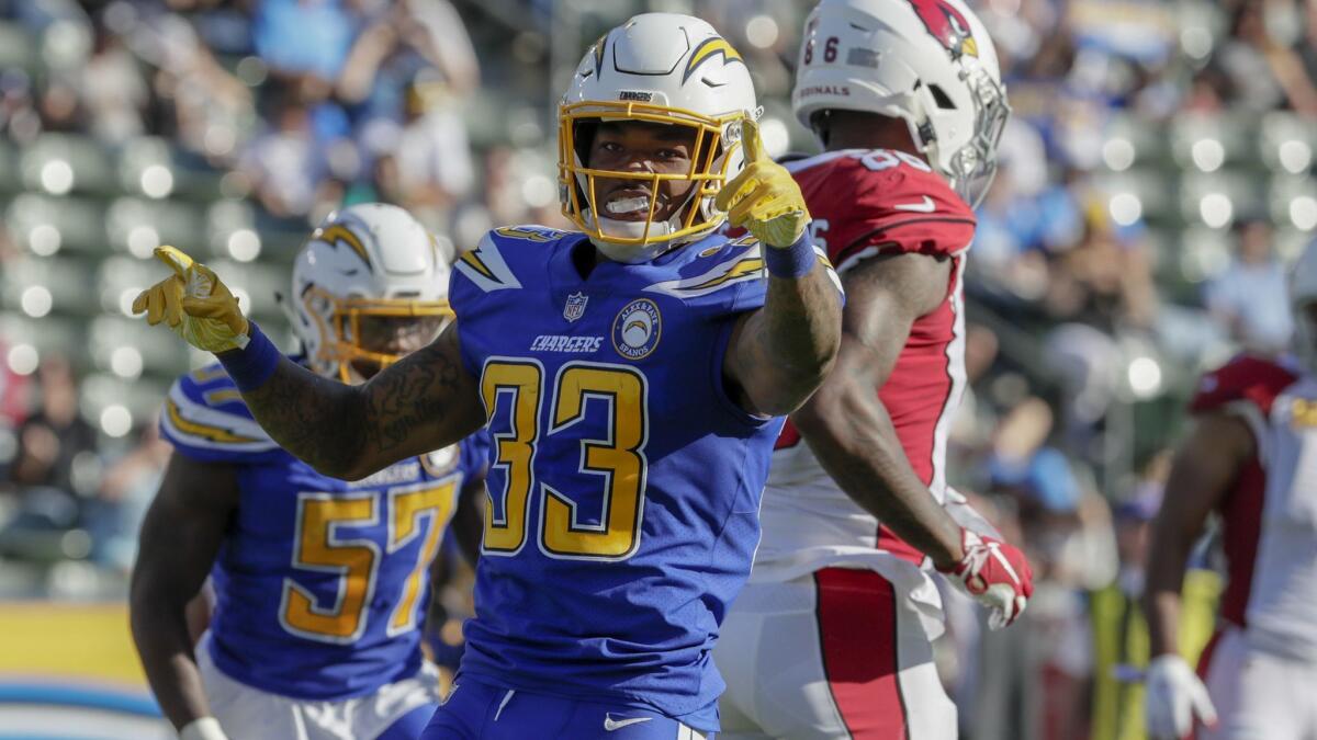 Chargers safety Derwin James celebrates after making a tackle against the Arizona Cardinals in November.