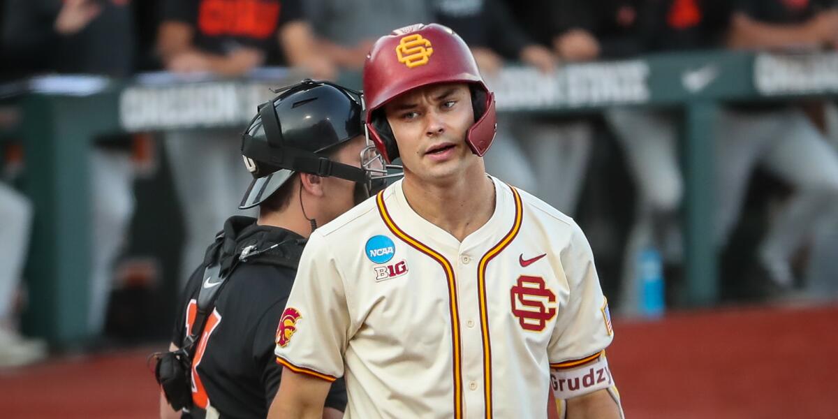 USC's Bryce Martin-Grudzielanek walks back to the dugout.