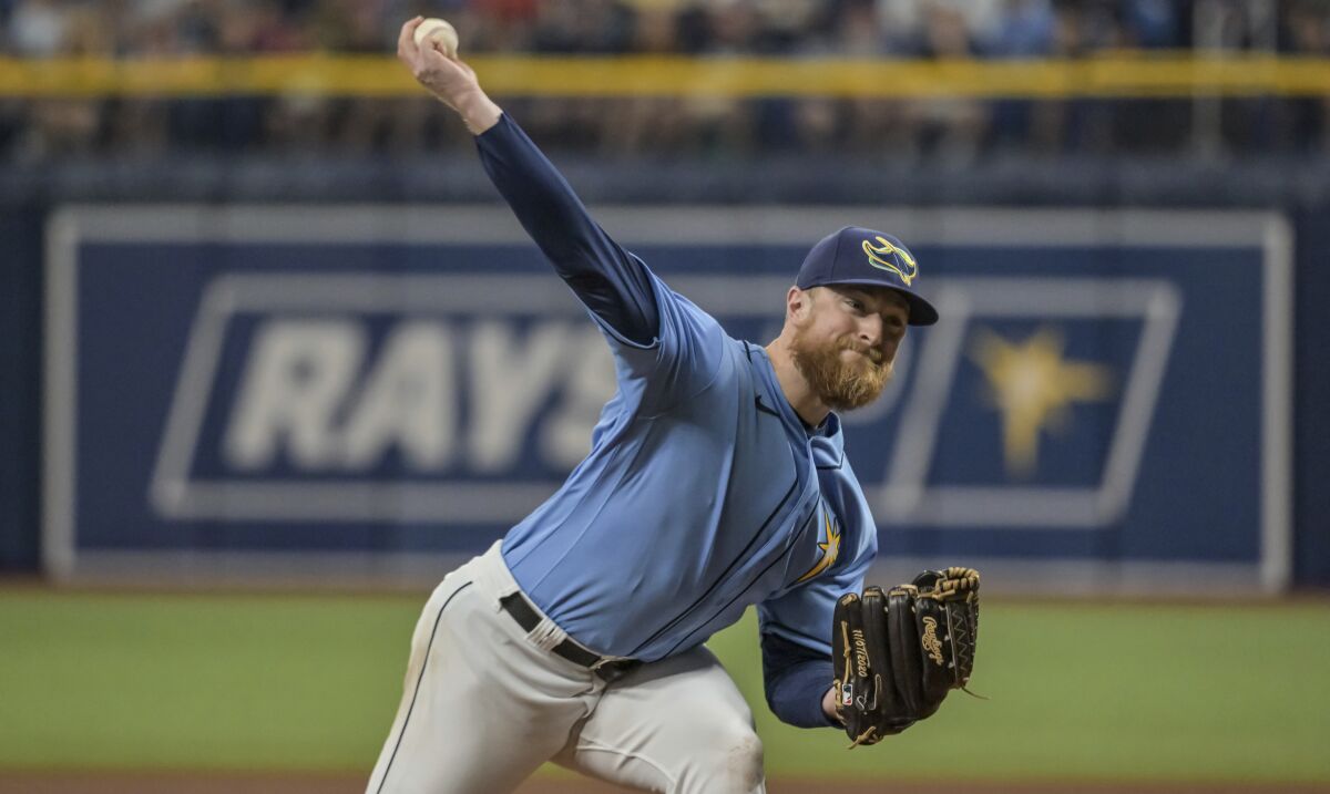 Tampa Bay Rays starter Drew Rasmussen pitches against the Baltimore Orioles during the eighth inning of a baseball game Sunday, Aug. 14, 2022, in St. Petersburg, Fla. (AP Photo/Steve Nesius)