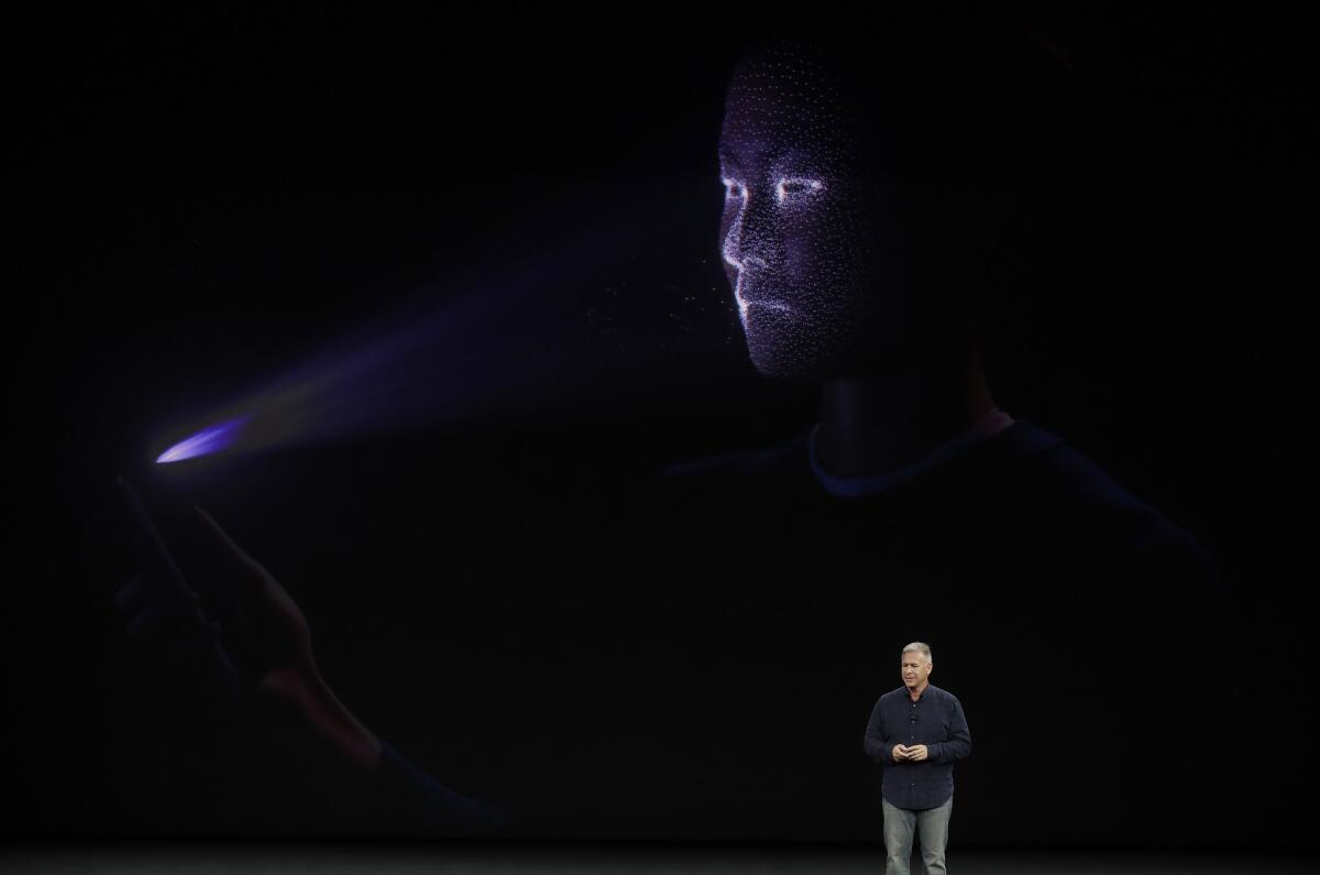 Phil Schiller, Apple's senior vice president of worldwide marketing, explains how Face ID works at the introduction of the new iPhone X on Tuesday in Cupertino, Calif.
