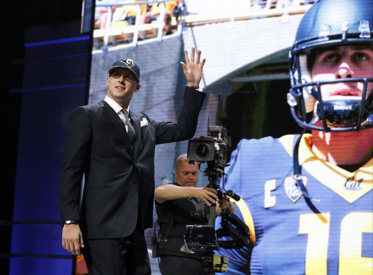 Quarterback Jared Goff waves after being selected by the Rams as the No. 1 overall pick in the 2016 NFL draft.
