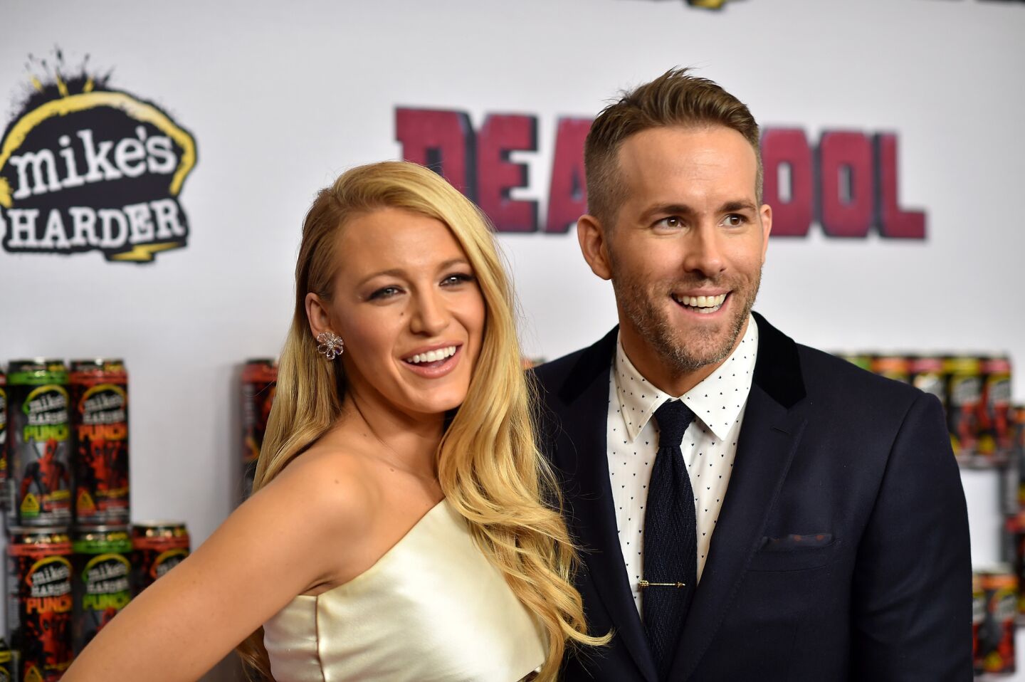 Actors Blake Lively, left, and Ryan Reynolds attend a "Deadpool" fan event at AMC Empire Theatre on Feb. 8, 2016 in New York City ahead of the Marvel film's release.