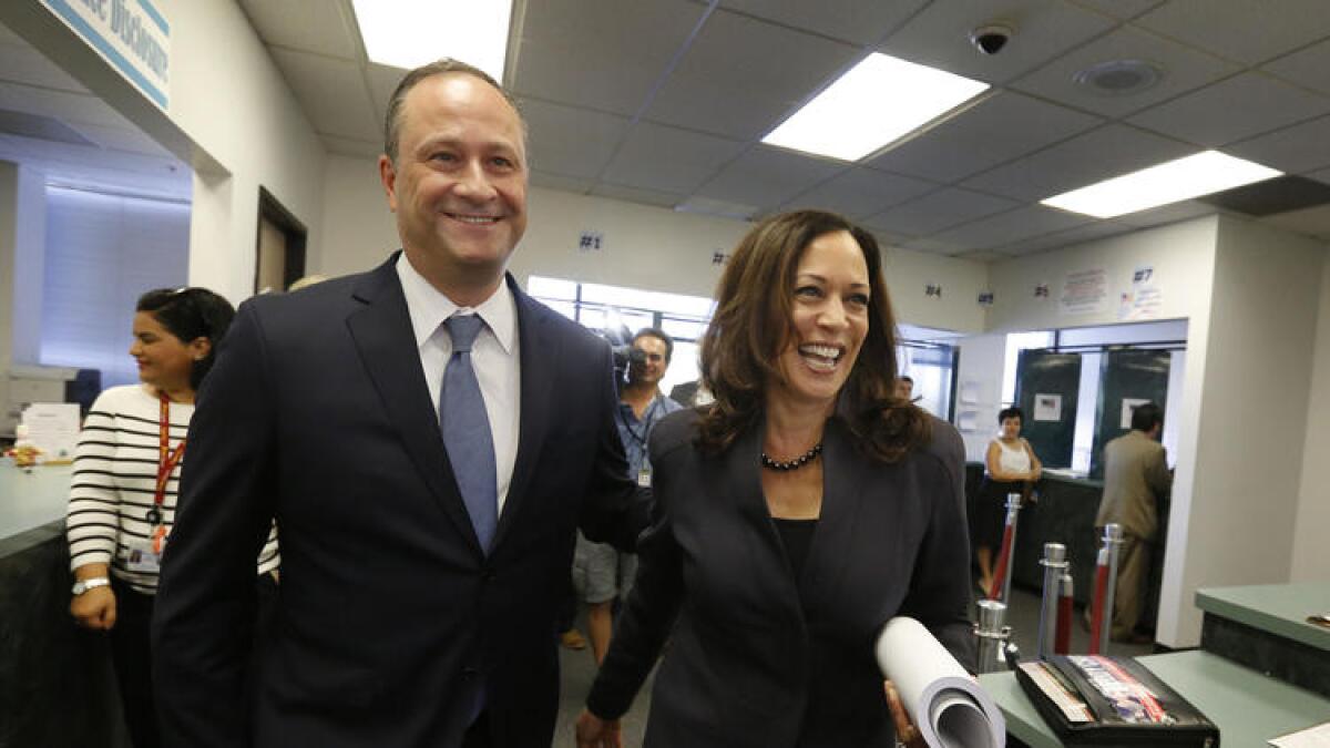 Atty. Gen. Kamala Harris files to run for the U.S. Senate in February at the Los Angeles County Registrar with her husband, Douglas Emhoff.