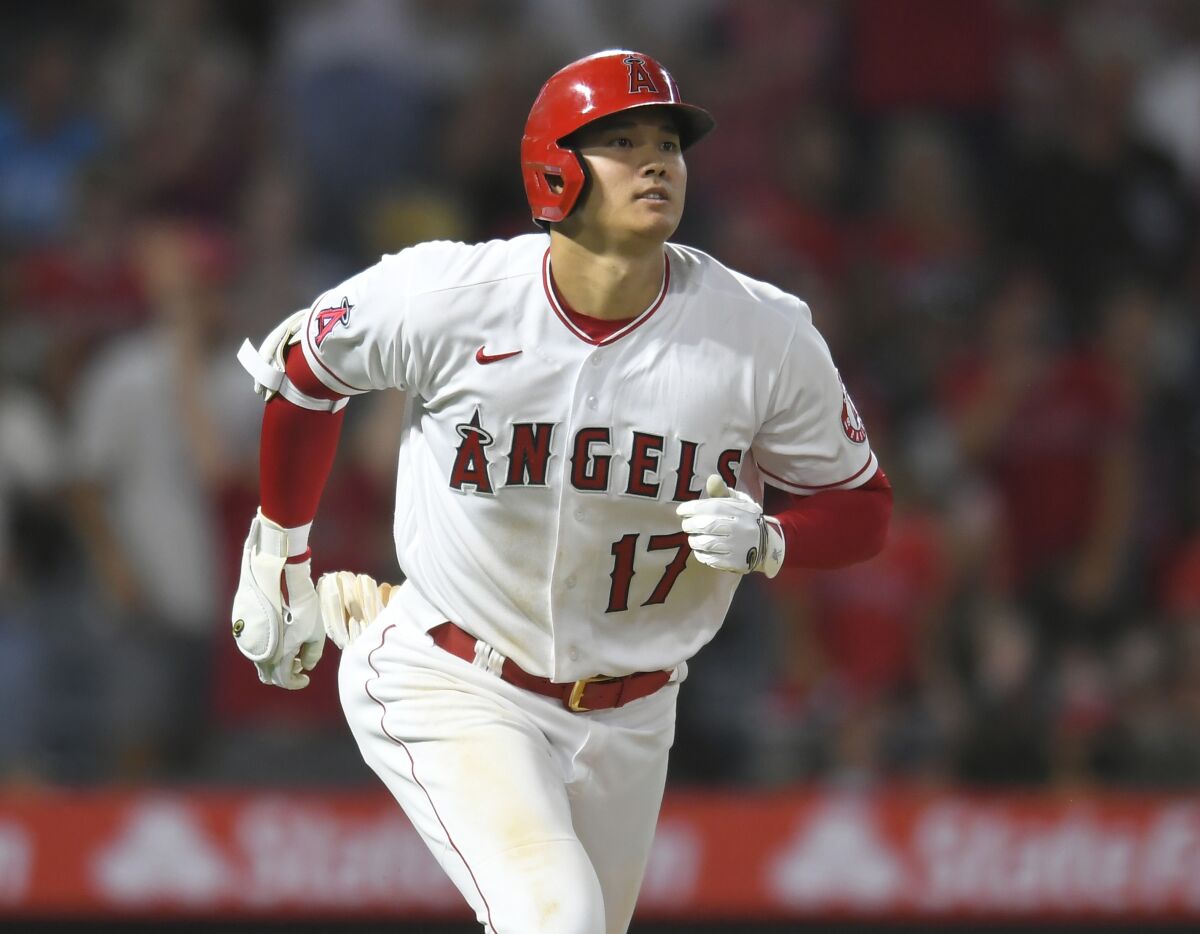 Los Angeles Angels designated hitter Shohei Ohtani runs to first.